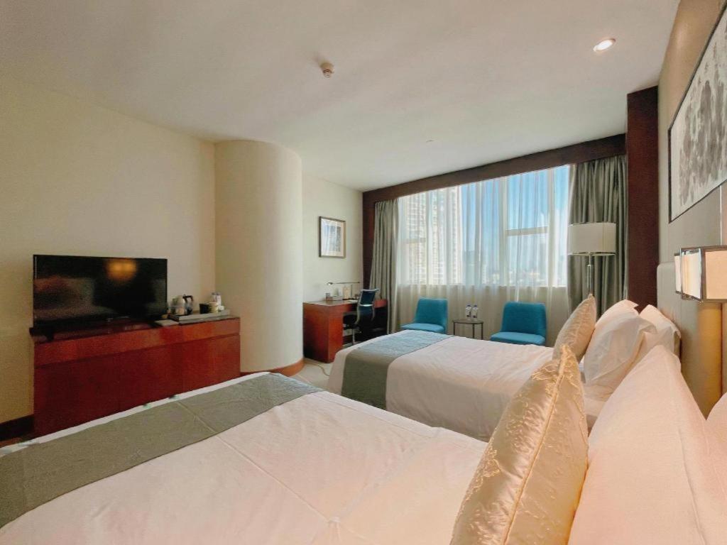 Grand Soluxe Zhongyou Hotel Shenzhen Exterior photo
